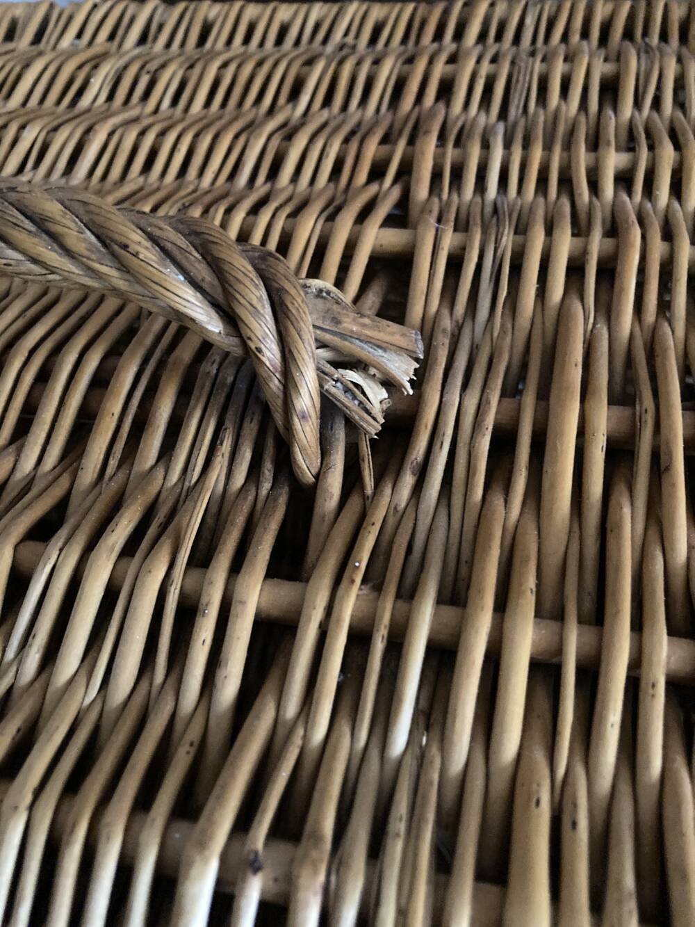 Antique wicker basket with closure and handle