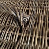 Antique wicker basket with closure and handle