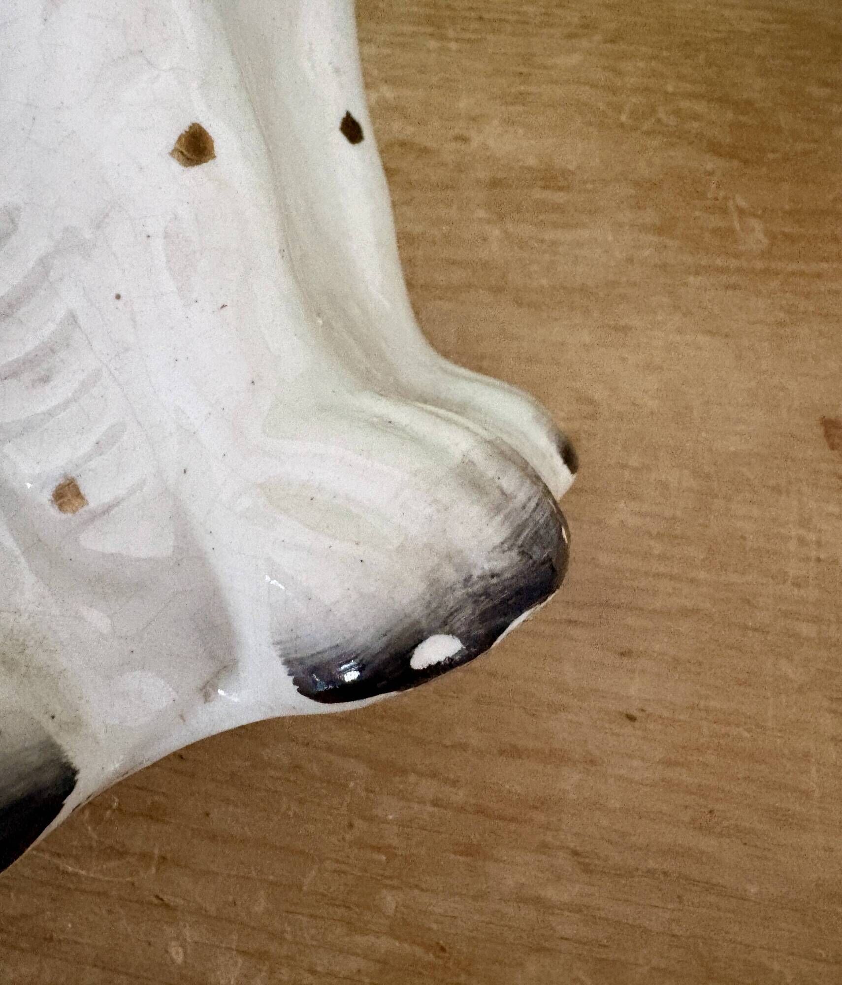 Pair of Staffordshire-type dogs in white and gold ceramic
