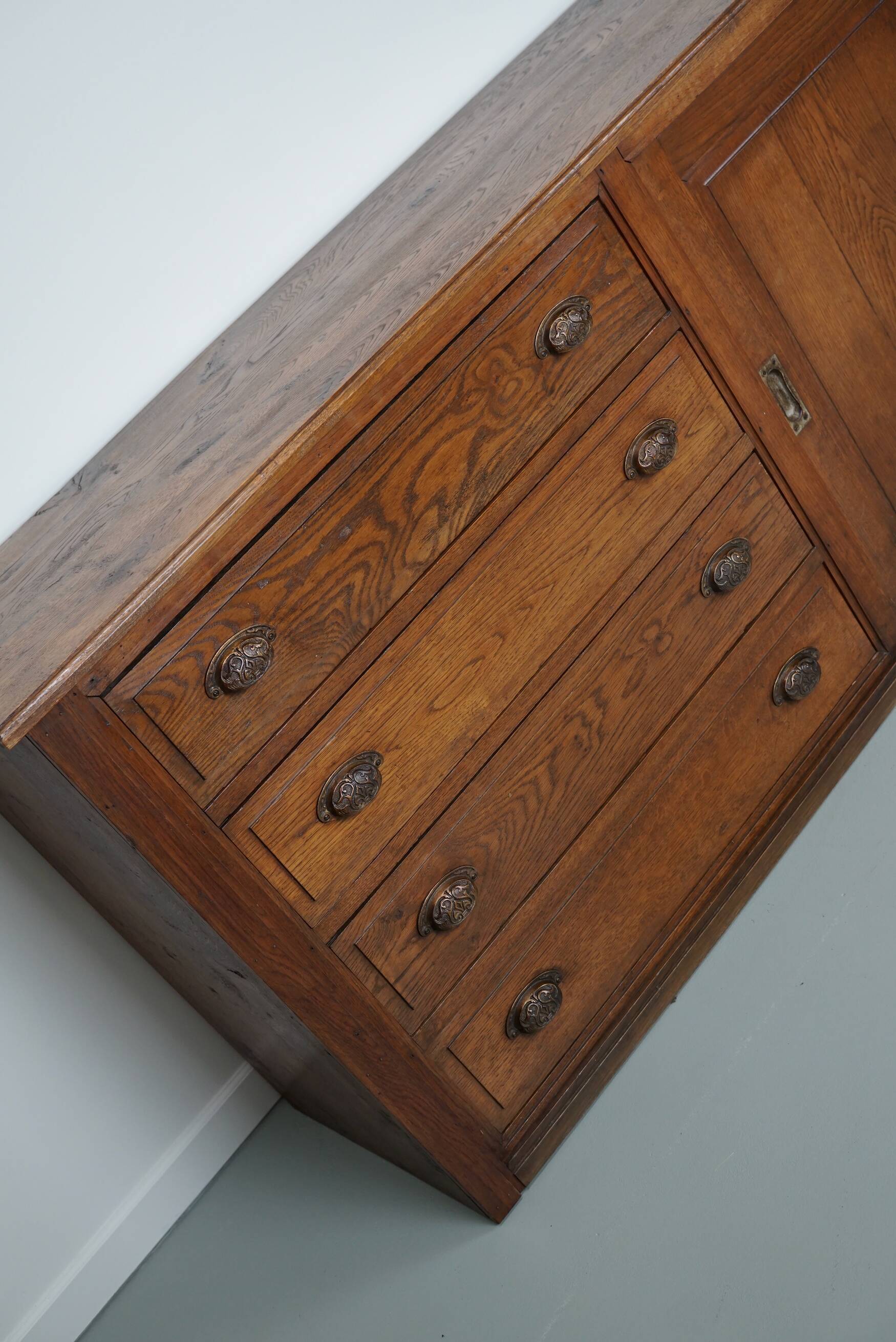 Antique french oak apothecary cabinet, circa 1900