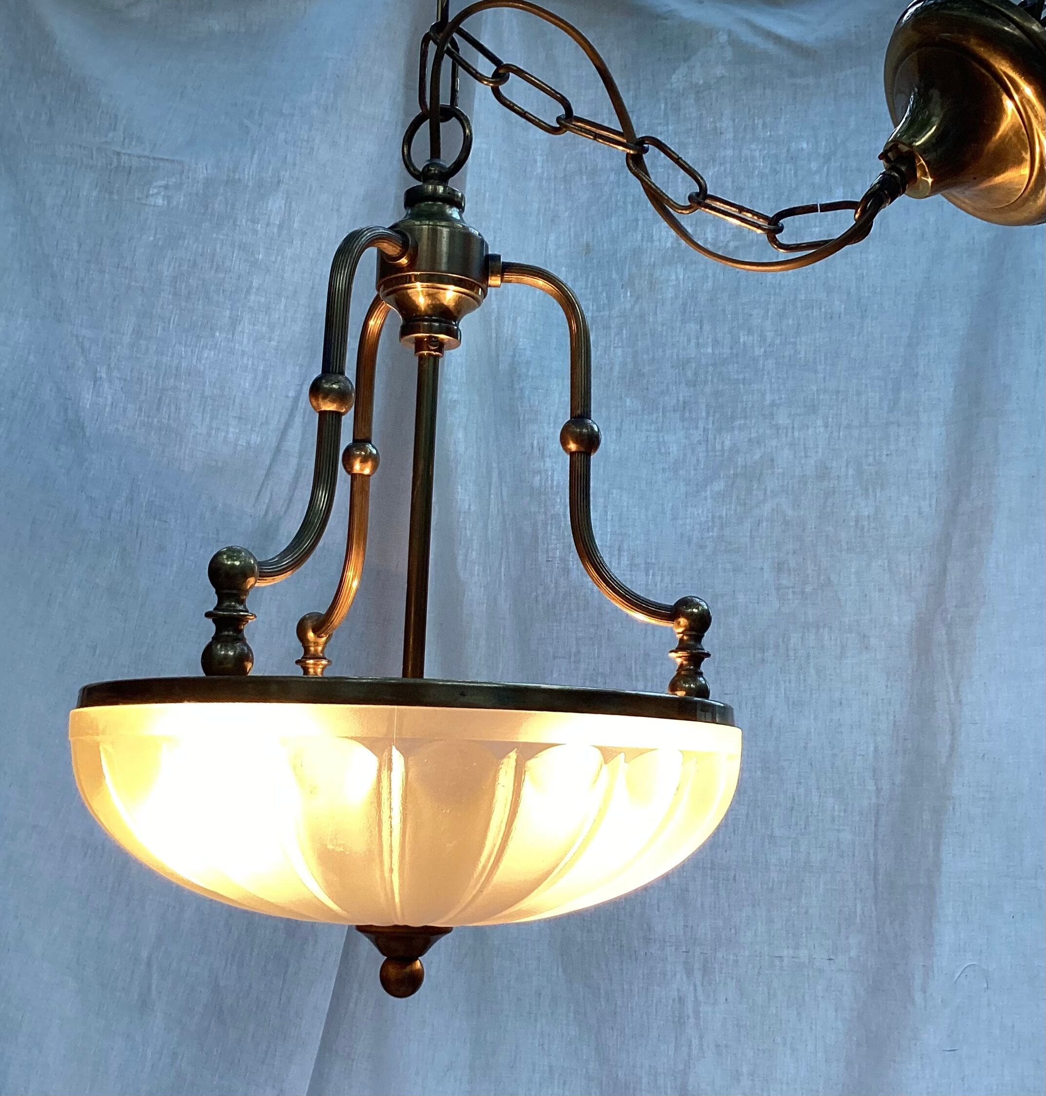 Vintage suspension in gilded brass and pressed glass