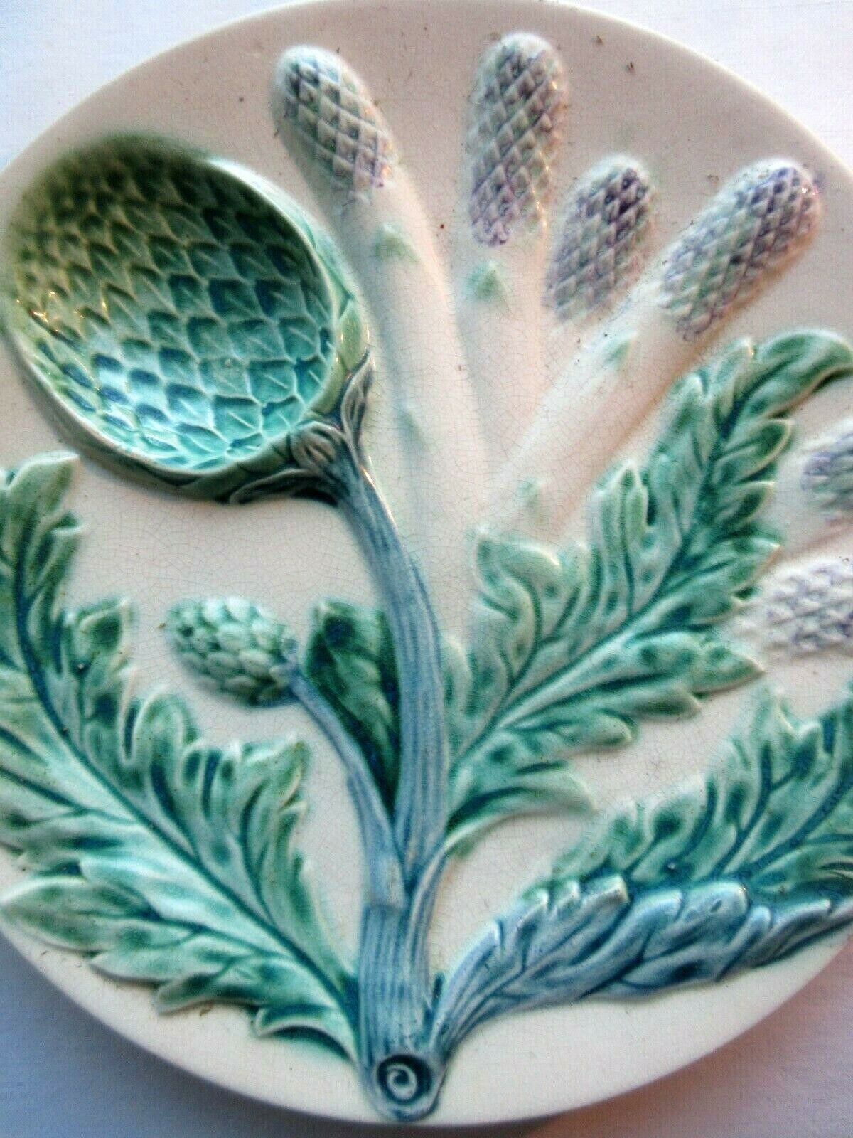 Plate of asparagus in splash of LUNEVILLE: Asparagus and Artichokes