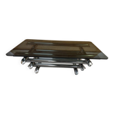 Smoked glass coffee table with chrome metal tubes in the style of Willy Rizzo.