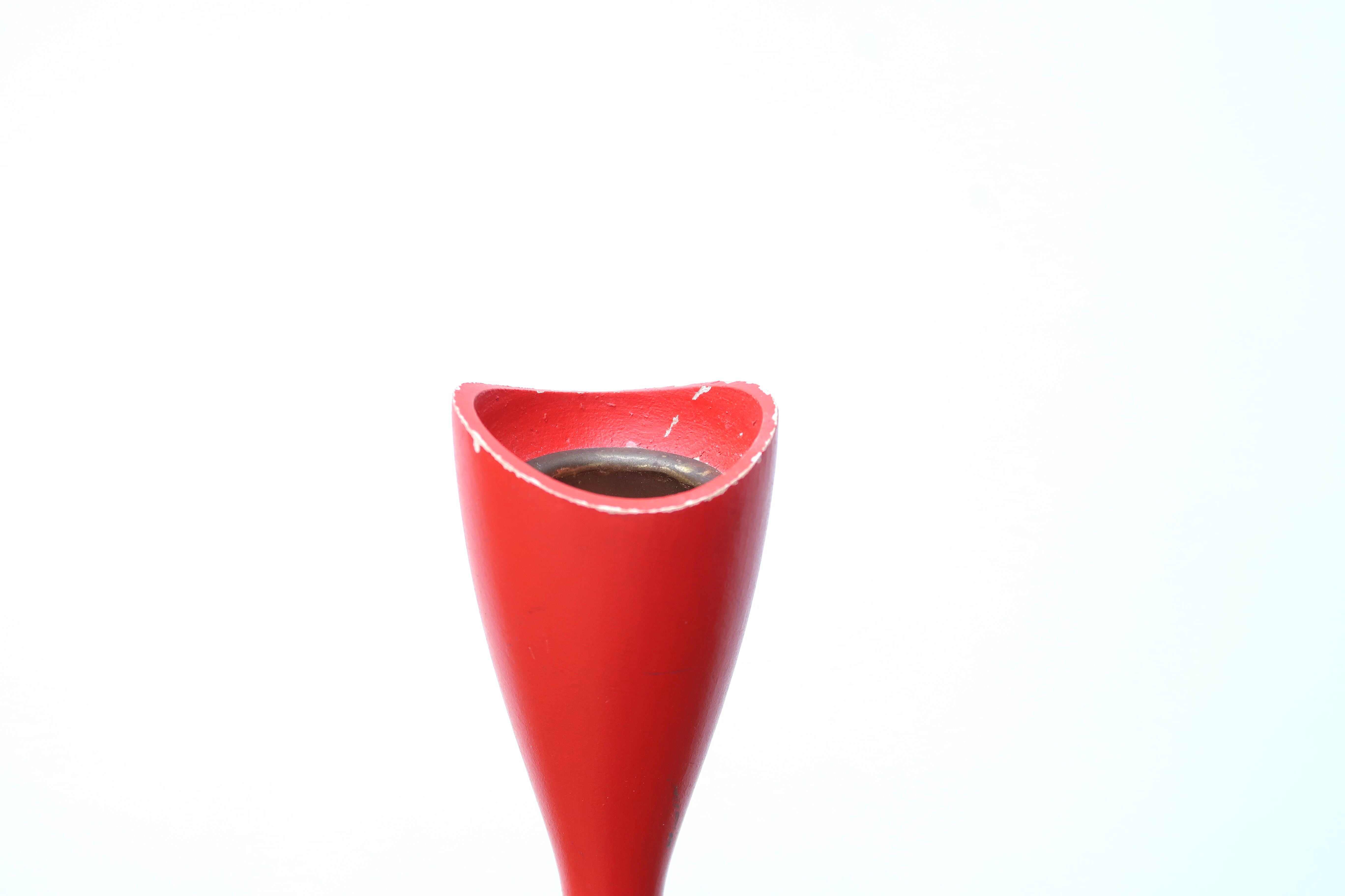 Red scandinavian wooden candlestick