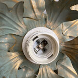 Metal flower sconce