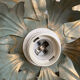 Metal flower sconce