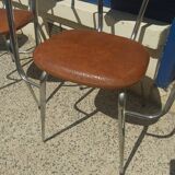 Set of 4 armchairs in chromed metal and brown imitation leather, circa 1960