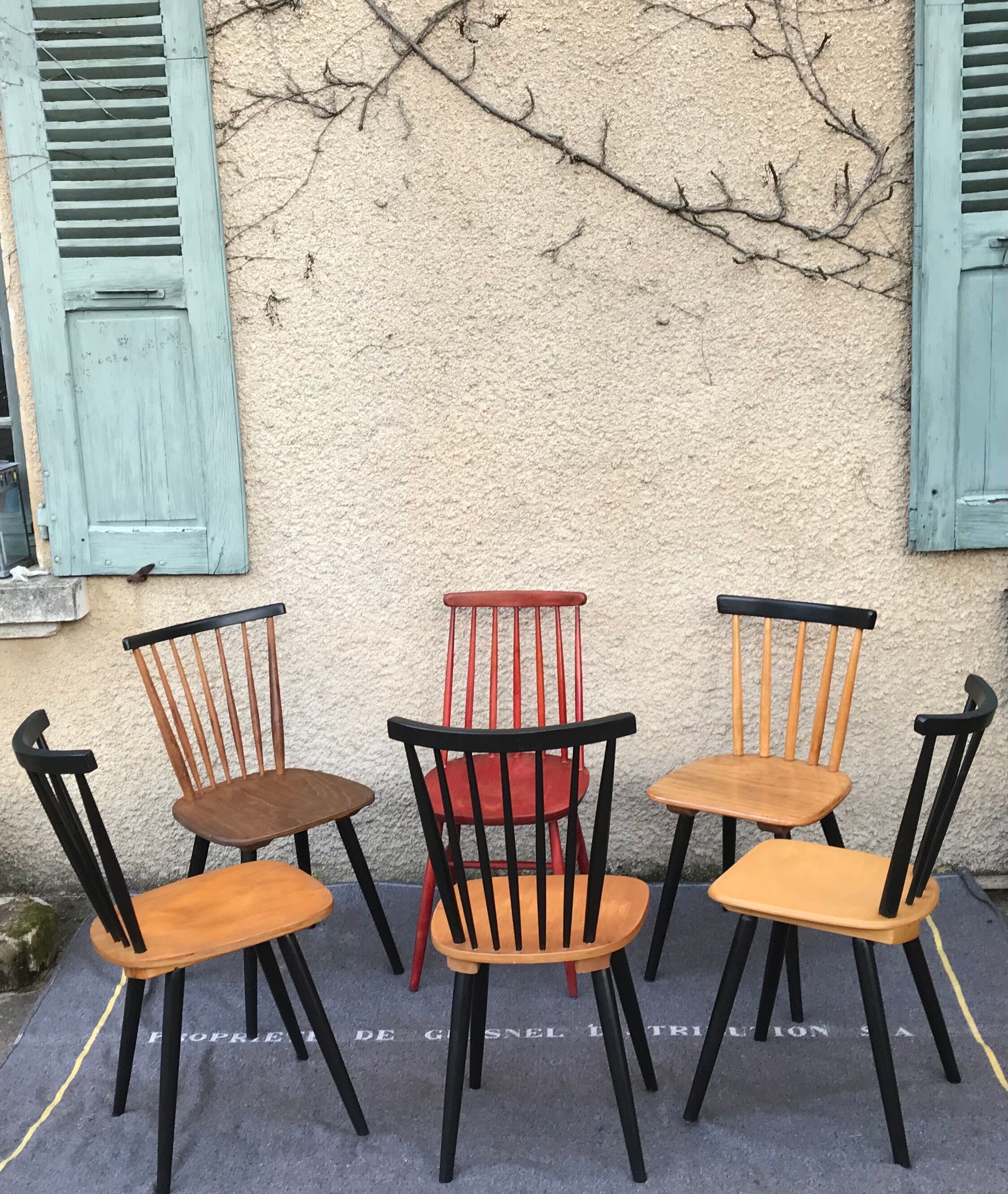 Set of 6 mismatched vintage chairs with bars and compass legs