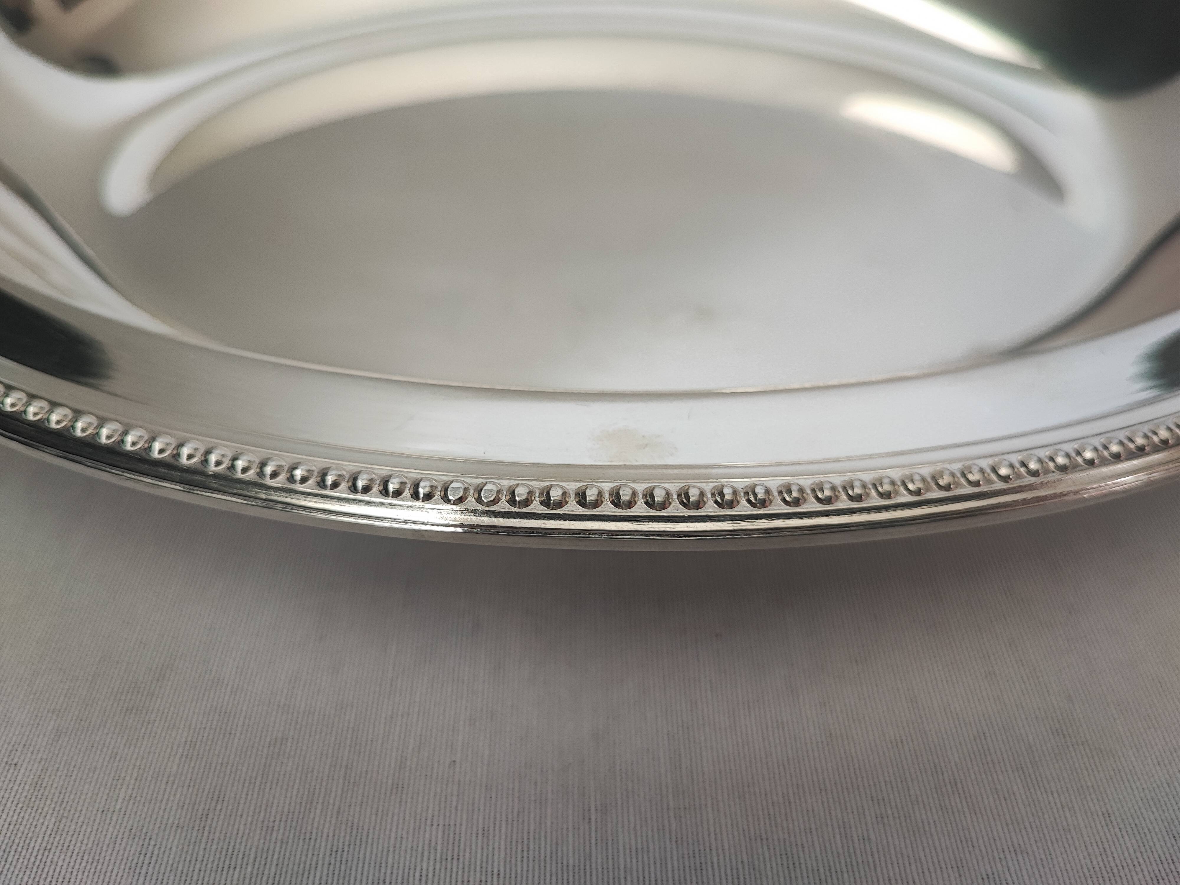 silver-plated metal salad bowl