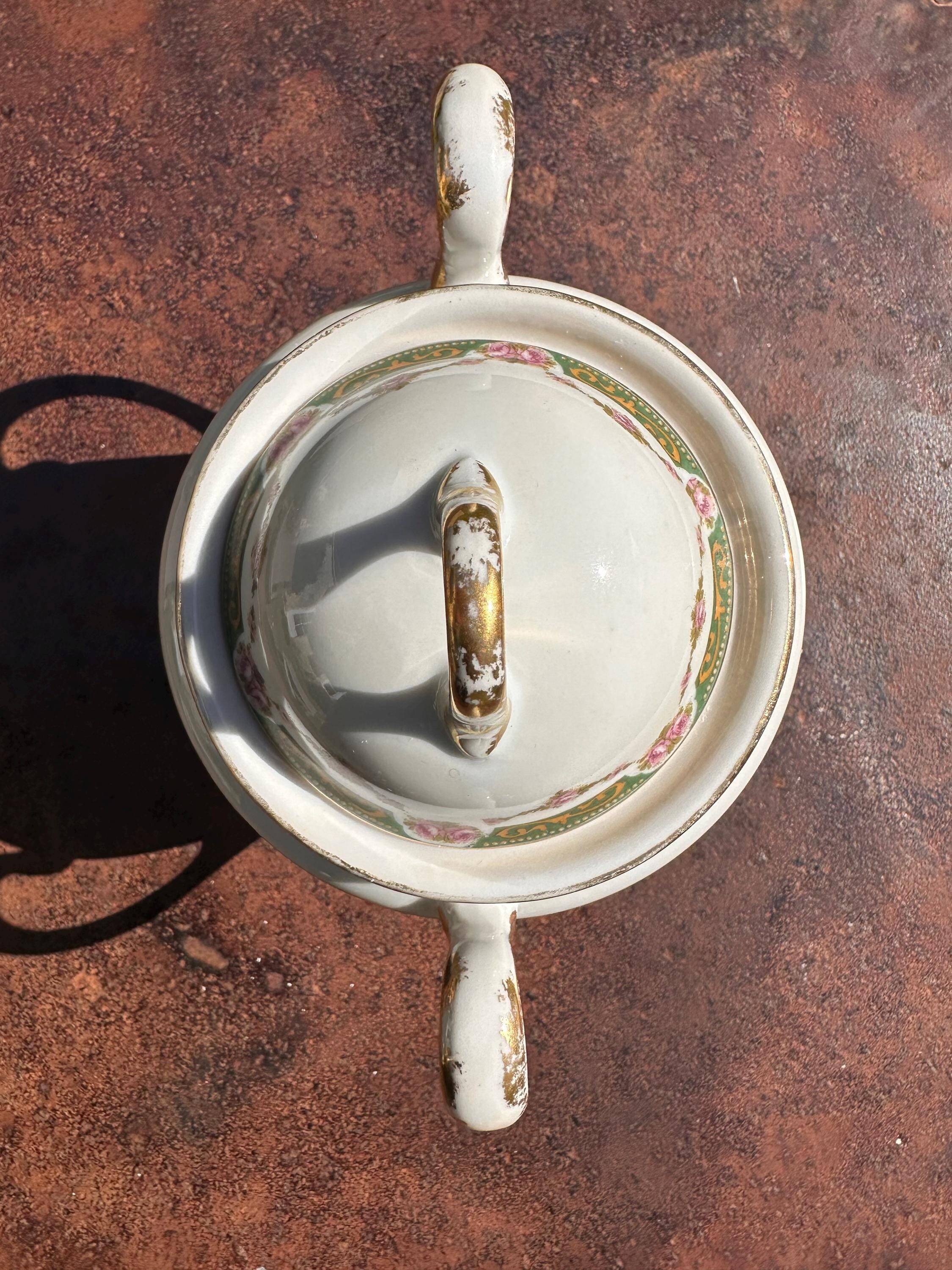 Set of jug, sugar bowl, and milk jug in Limoges porcelain by Paul Past.