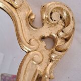 Wooden and gilded mirror with gold leaf