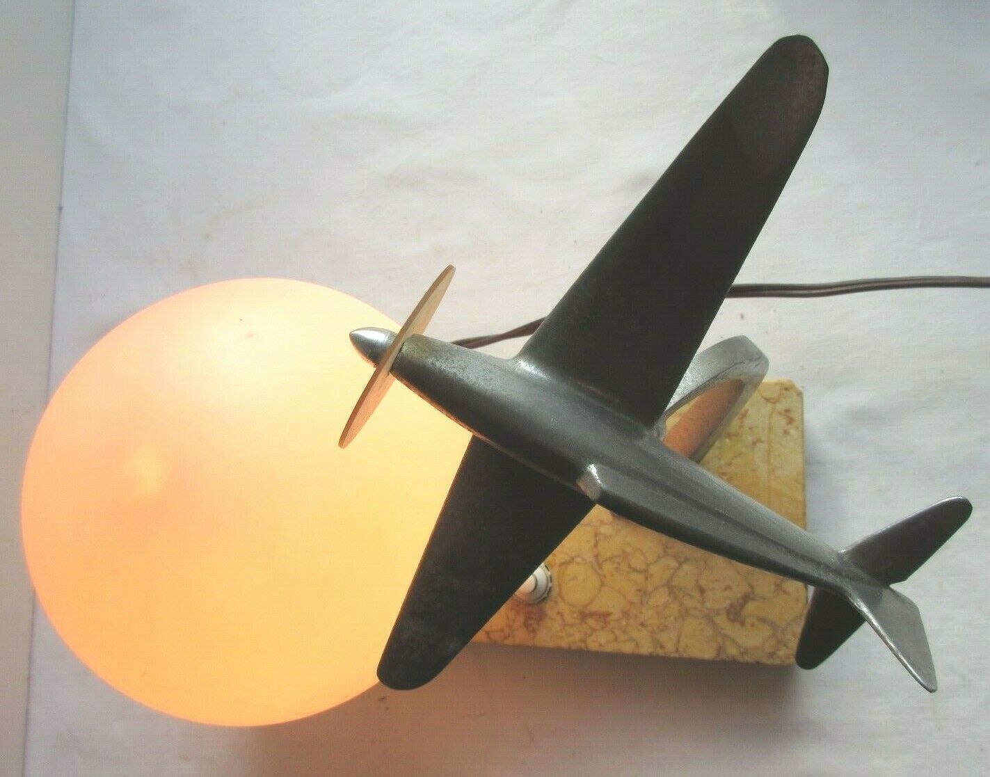 Art deco table lamp aluminum airplane and ball tulip on marble terrace