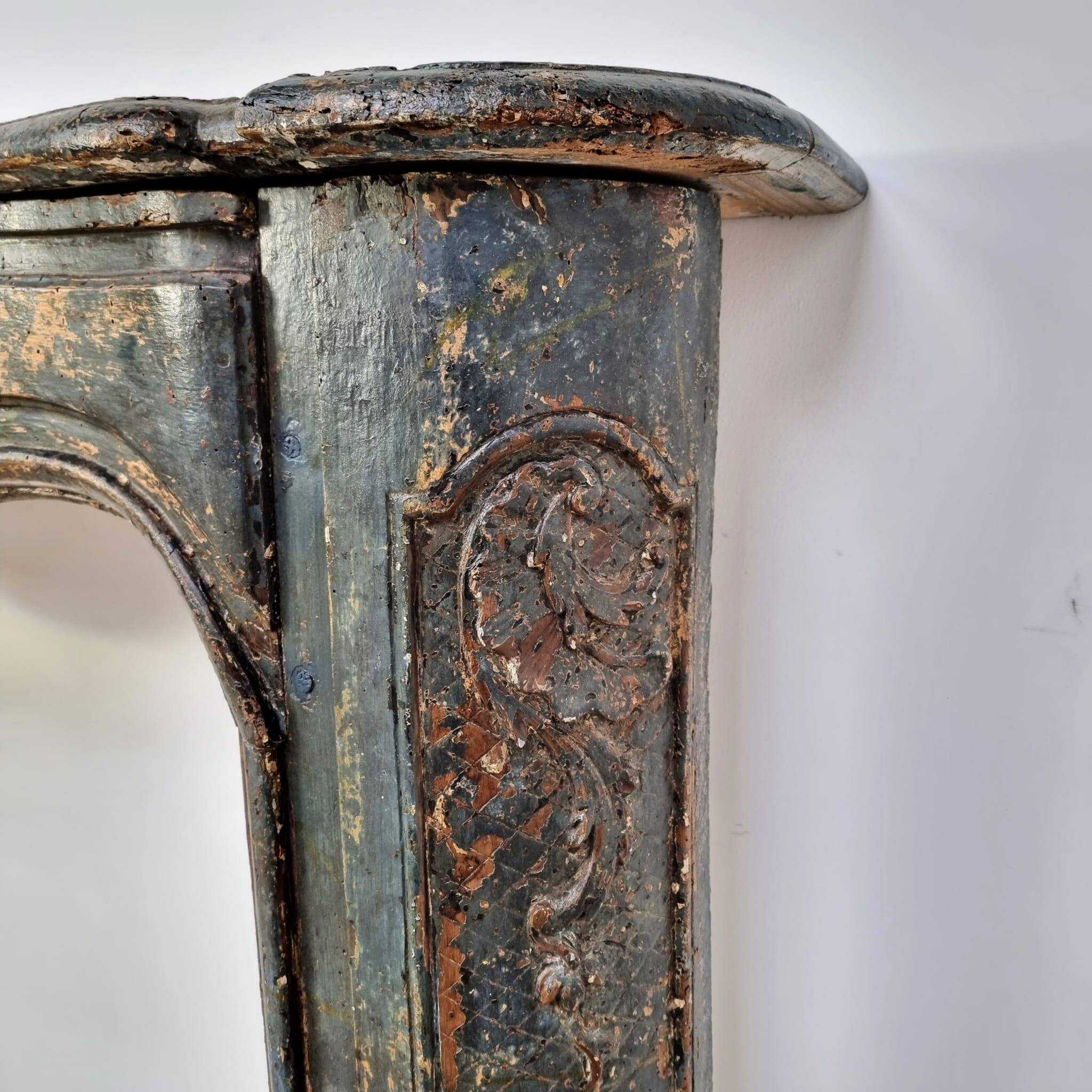 18th century carved wooden fireplace