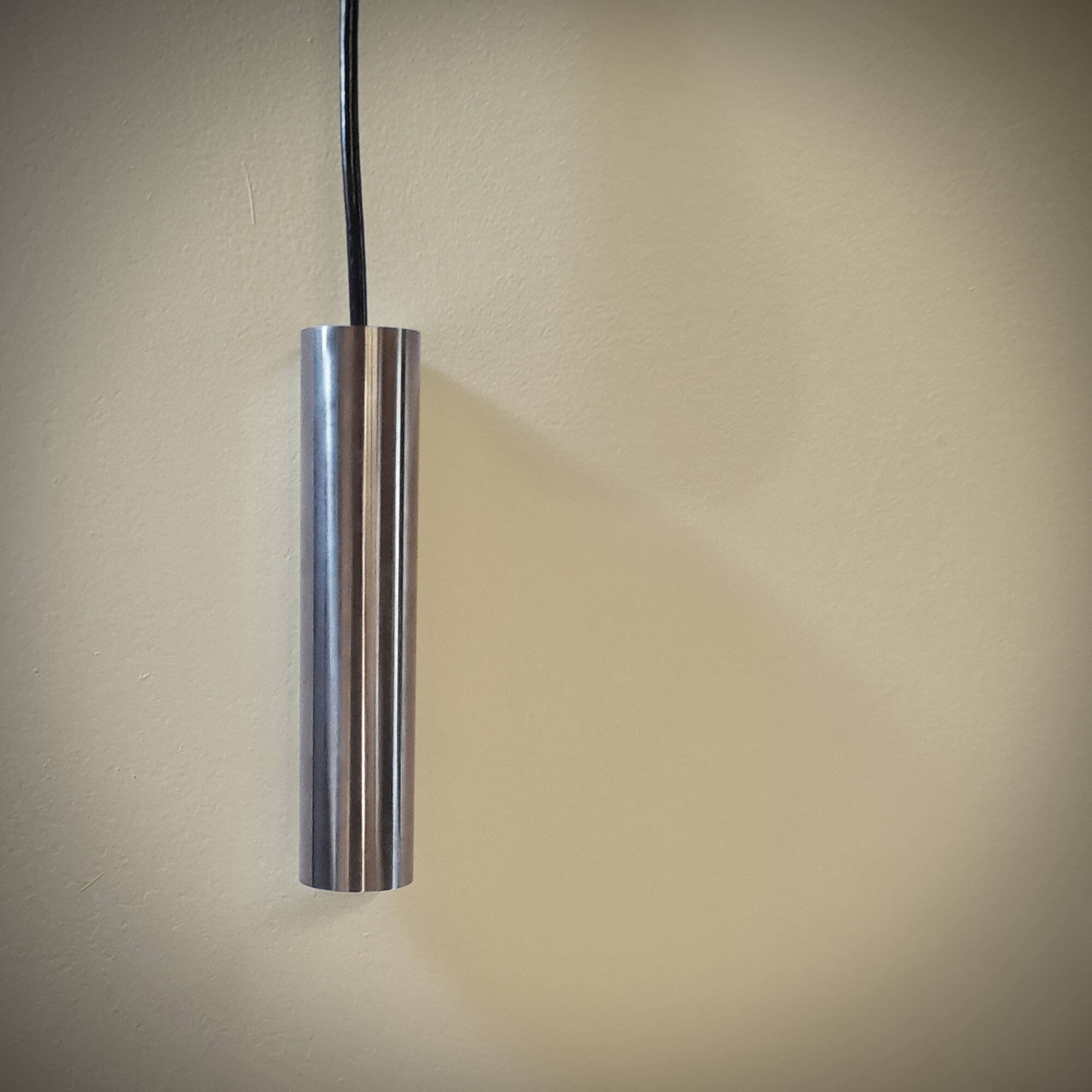 Still brand tube pendant light in polished stainless steel, 1970s, NEW