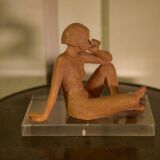 Terracotta sculpture of a seated woman by Norbert Treca contemporary art.