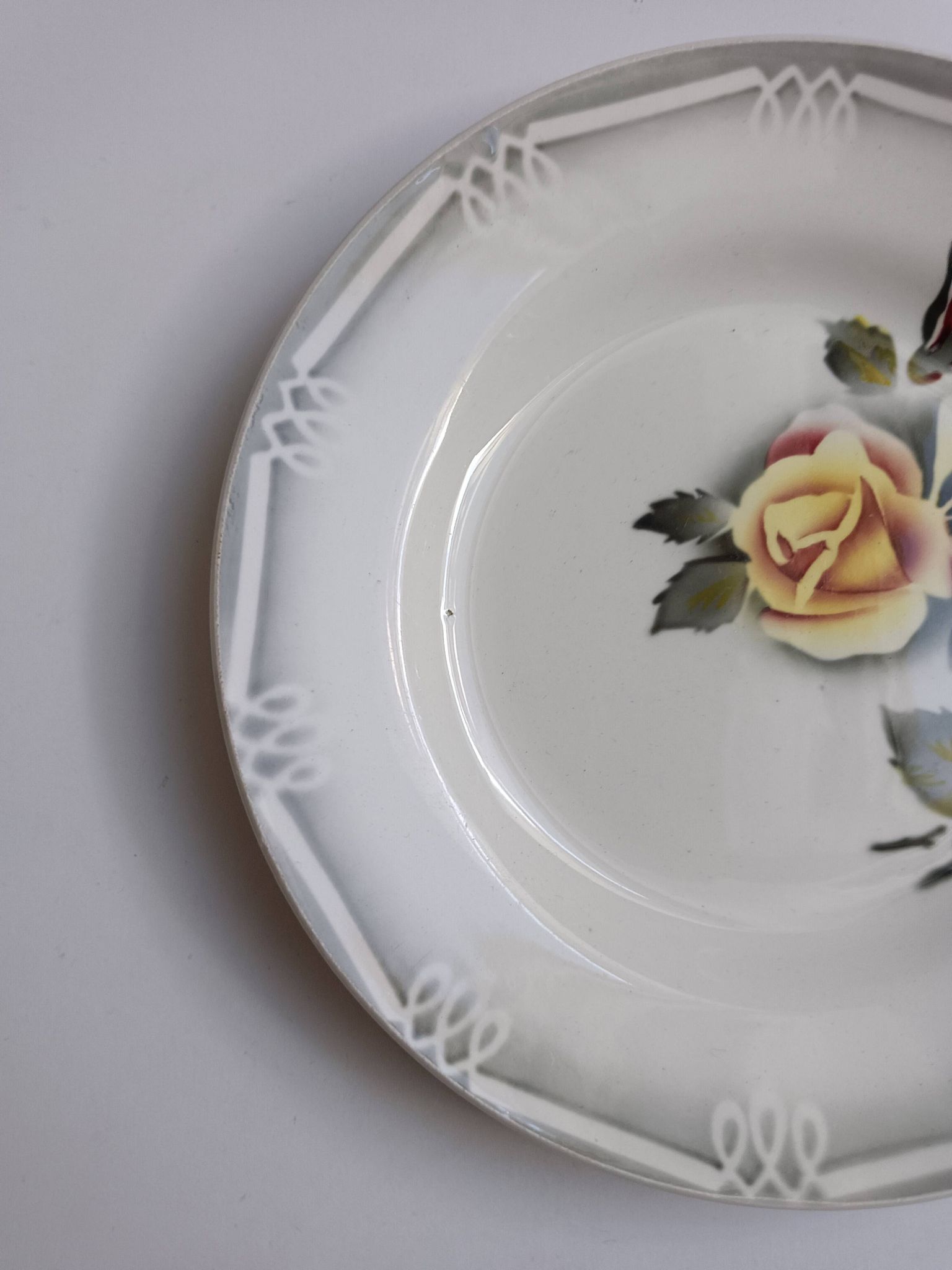 3 Digoin Sarreguemines Adèle plates in grey, yellow, and burgundy.