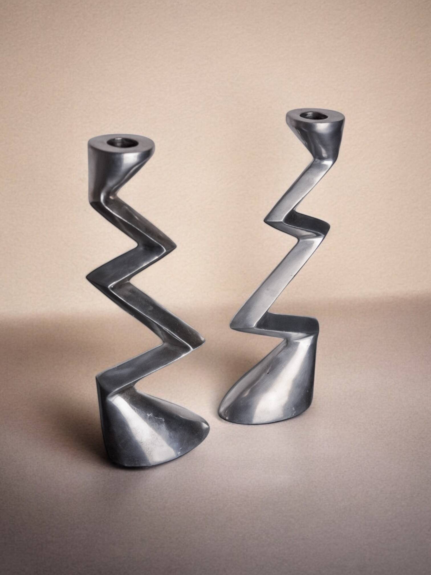 Pair of zigzag candlesticks, England, 1980