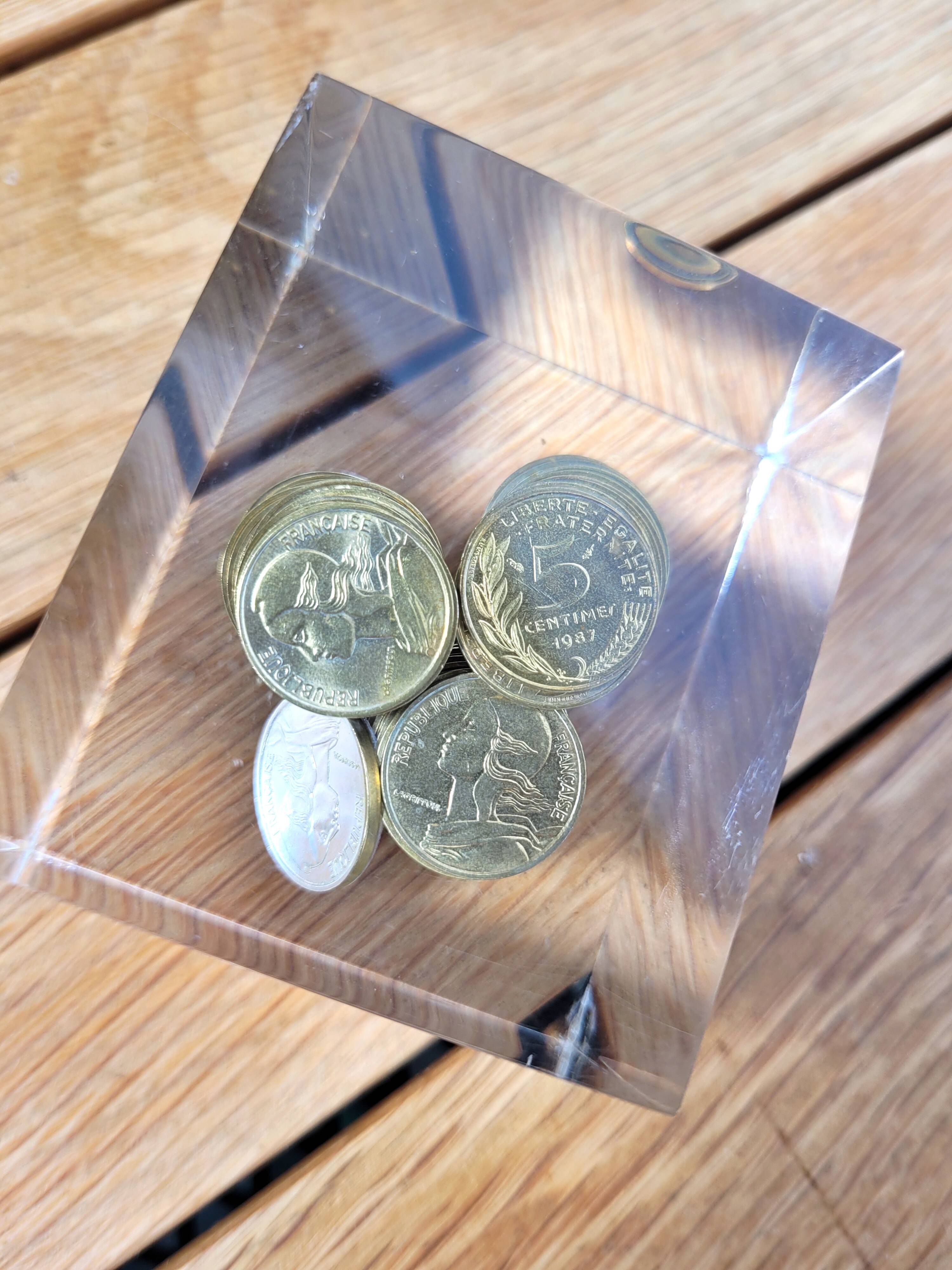 Inclusion presse papier pièces de 5cts francs