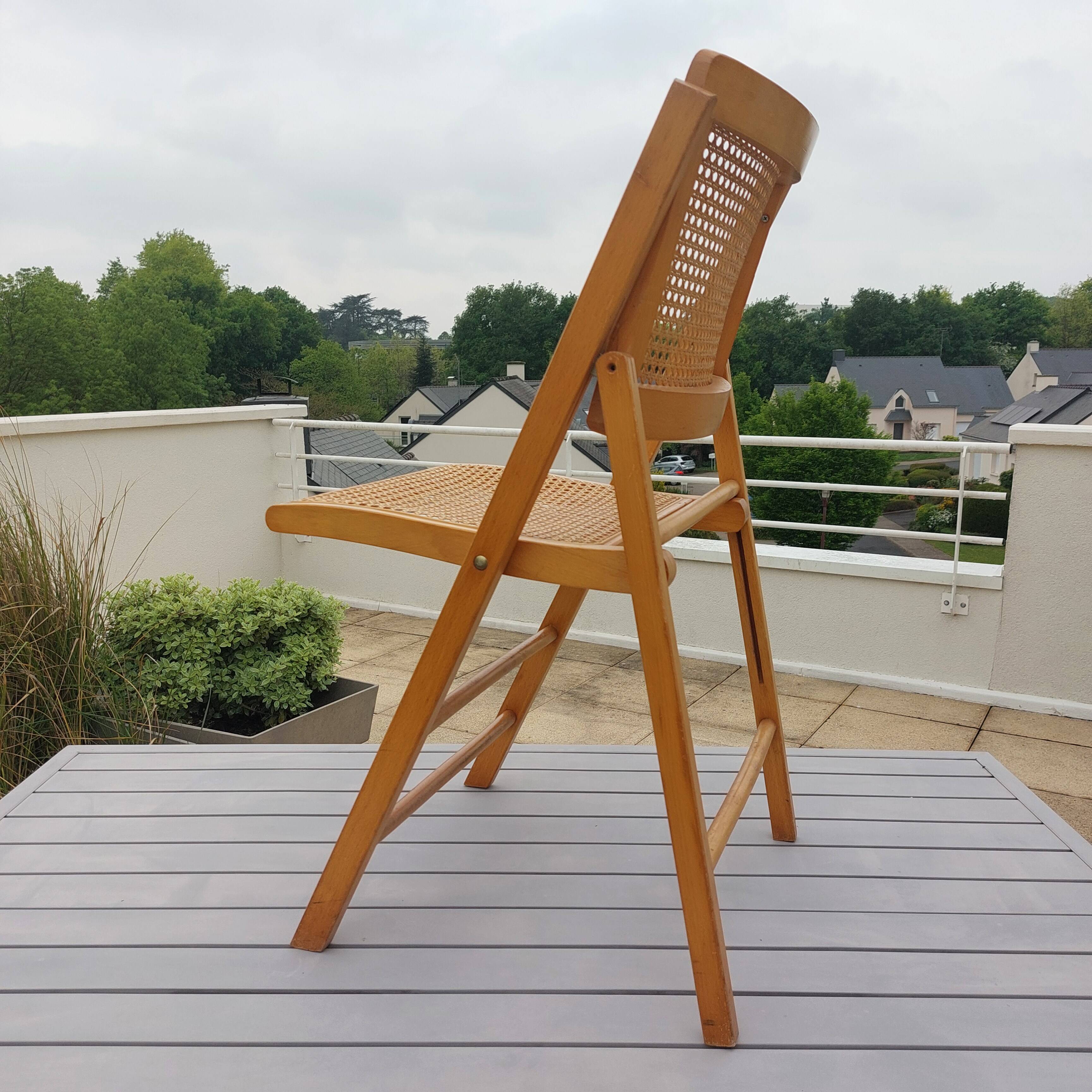 Vintage woven cane folding chair from the 80s