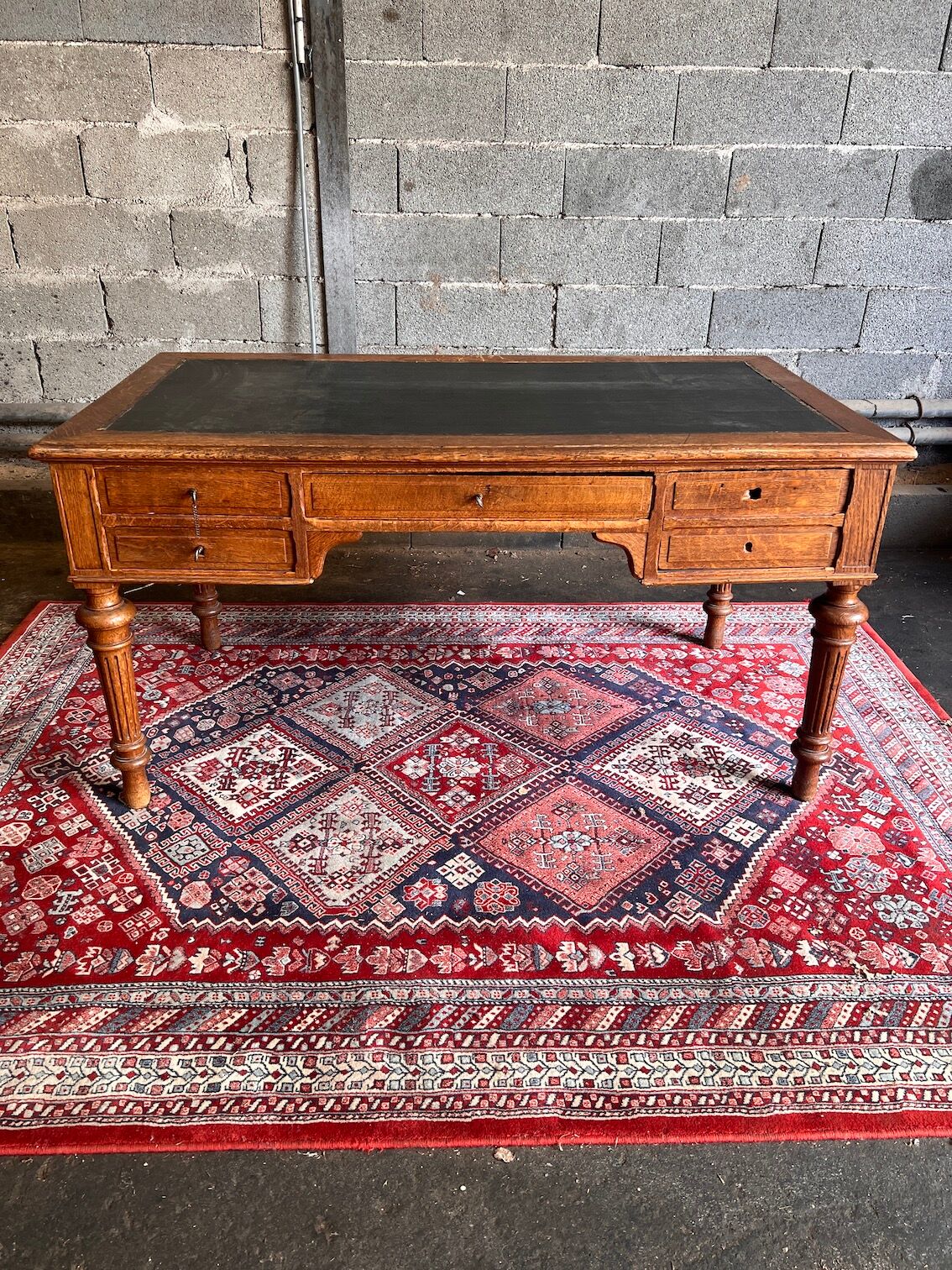 Louis Philippe antique desk with leather-wrapped top