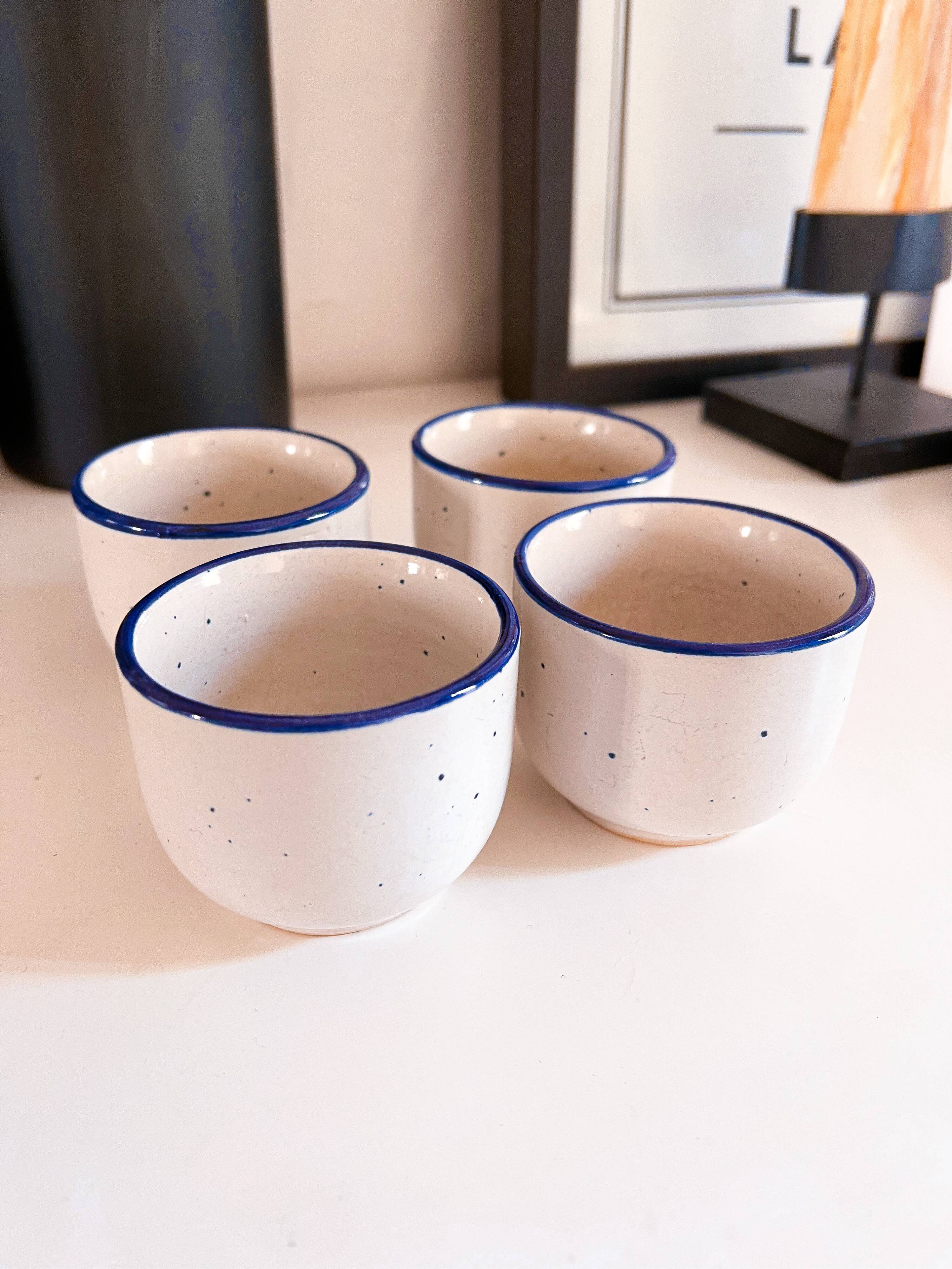 4 ancient sandstone cups