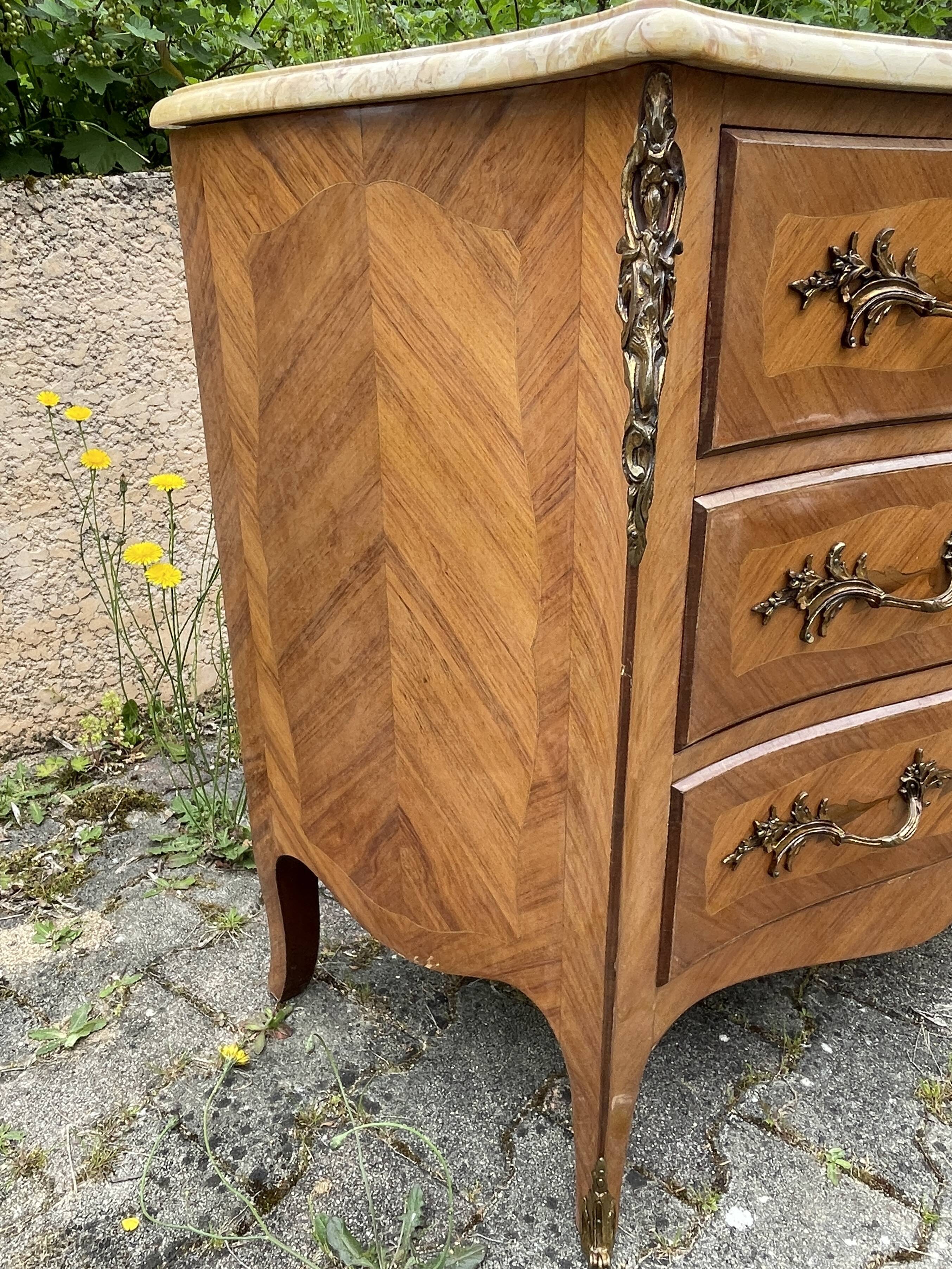 Louis XV style commode in marquetry, 20th century.