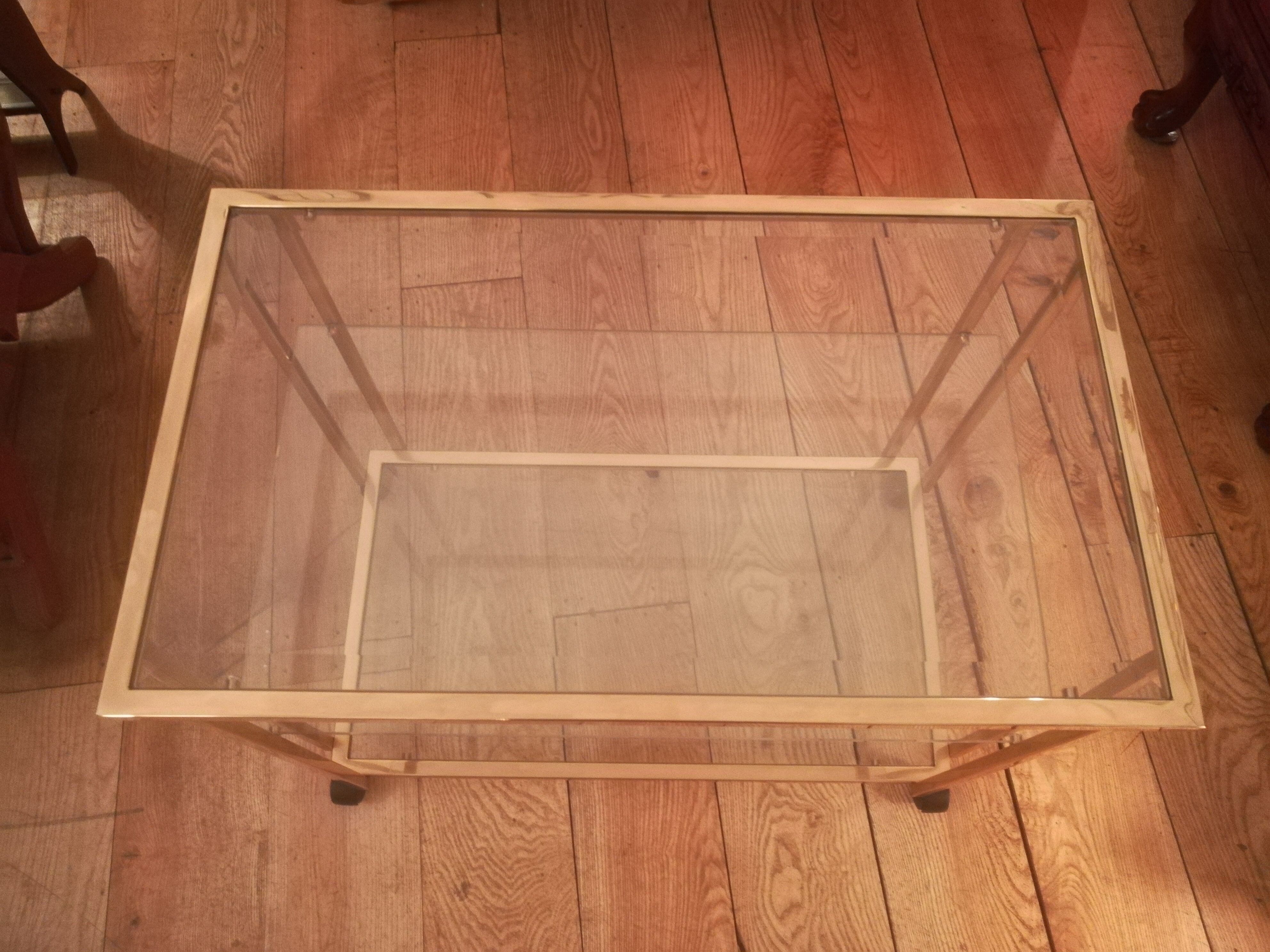 Trolley on wheels in gilded brass and beveled glass