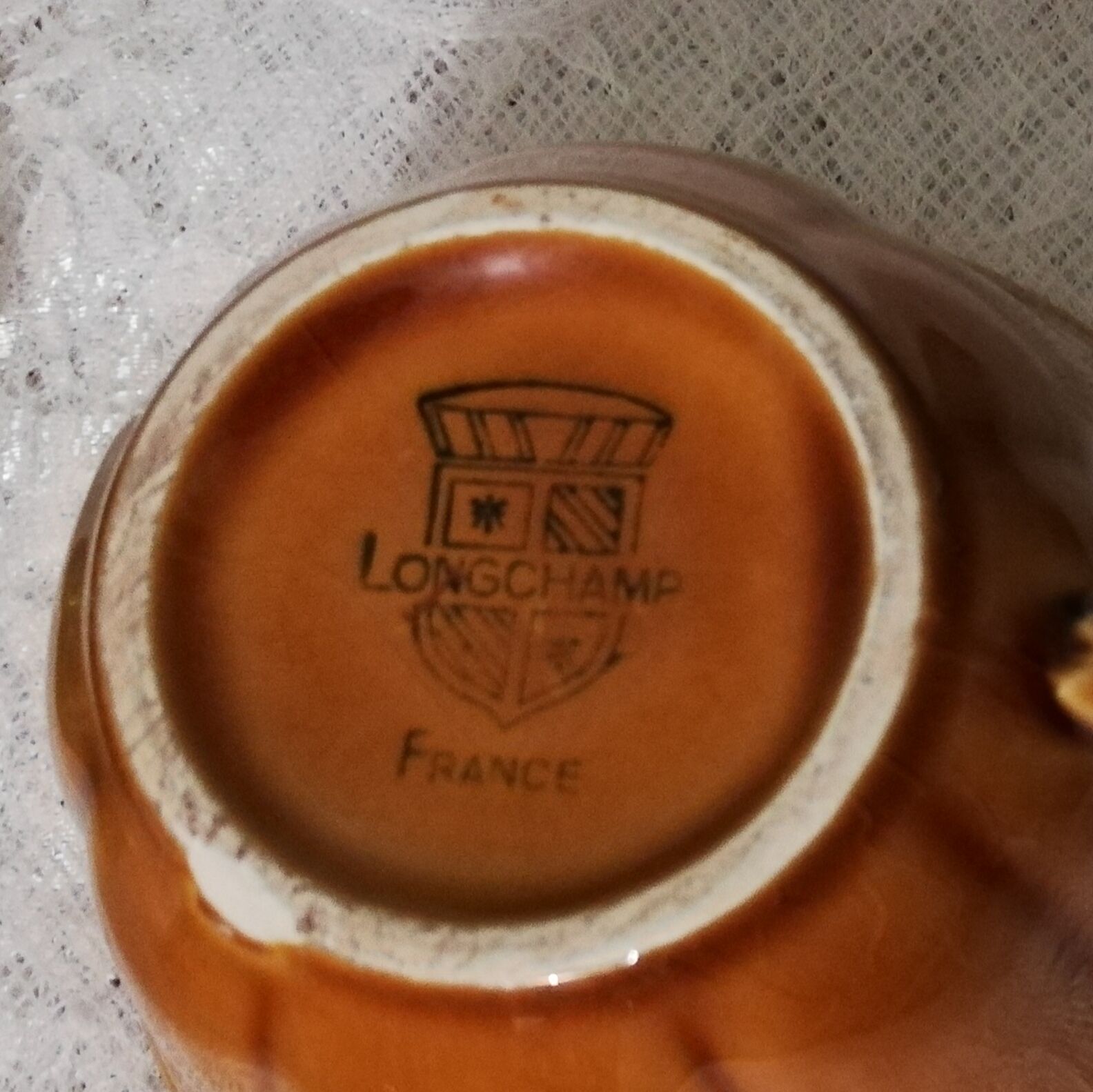 5 coffee or tea cups signed Longchamp