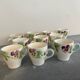 10 slipware cups, pansies