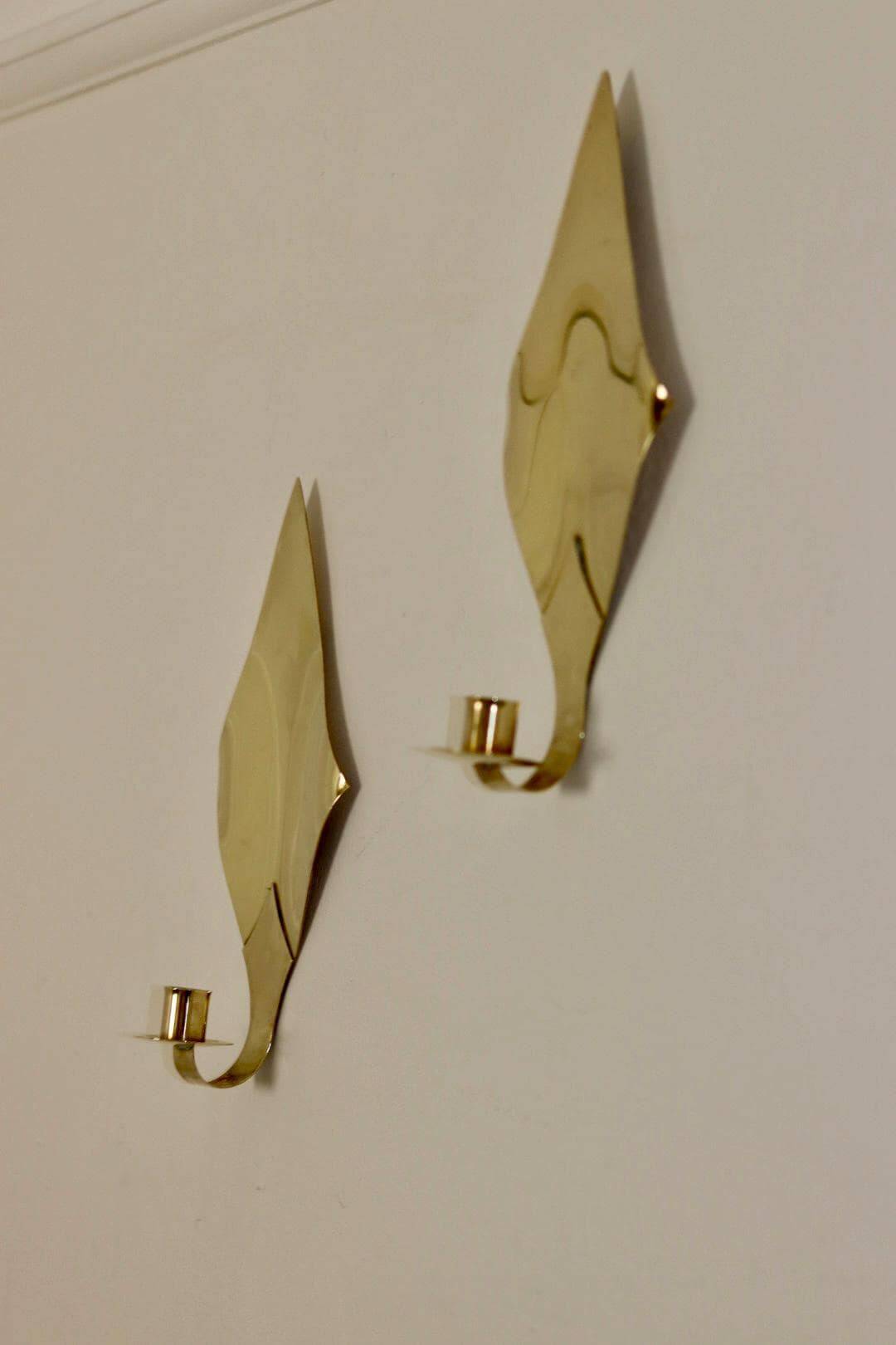 Pair of Swedish brass wall sconces from the mid-century.