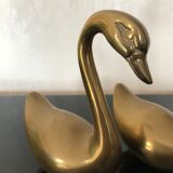 Brass swans