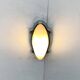 Postmodern Italian wall lamp for indoor and outdoor use, Geco 1 by Luciano Pagani and Angelo Perversi for Arteluce, 1990s.