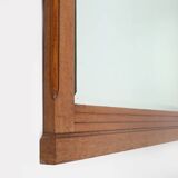 Miroir Art Déco en chêne à décors sculptés et miroir à facettes, années 1930