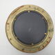 Mirror integrated into a brass navy porthole