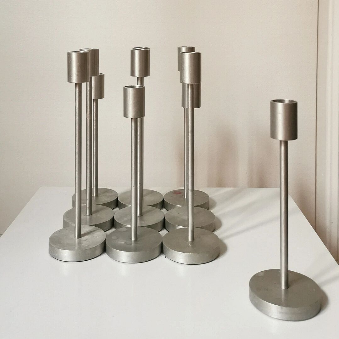Set of 10 aluminium candle holders.