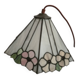 Tiffany-style stained glass lampshade with floral motifs.