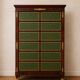 Empire-style mahogany cabinet – 12 drawers lined with green leather –