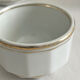 5 vintage porcelain bistro coffee cups from Paris with gold trim.