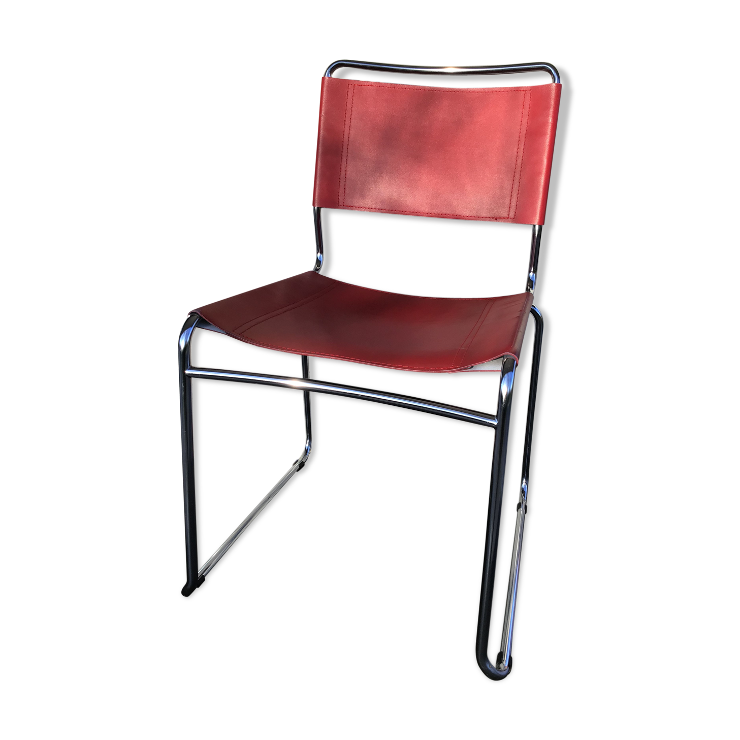 Chrome sled chair and red leather