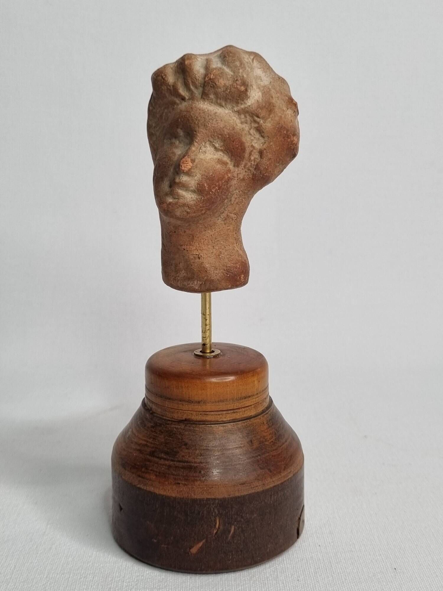 Female head in terracotta, Tanagra – Antique fragment – 4th–2nd century 14.5 cm
