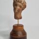 Female head in terracotta, Tanagra – Antique fragment – 4th–2nd century 14.5 cm