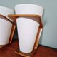 Pair of Philips teak and opaline wall lights, designed by Louis Kalff, 1950