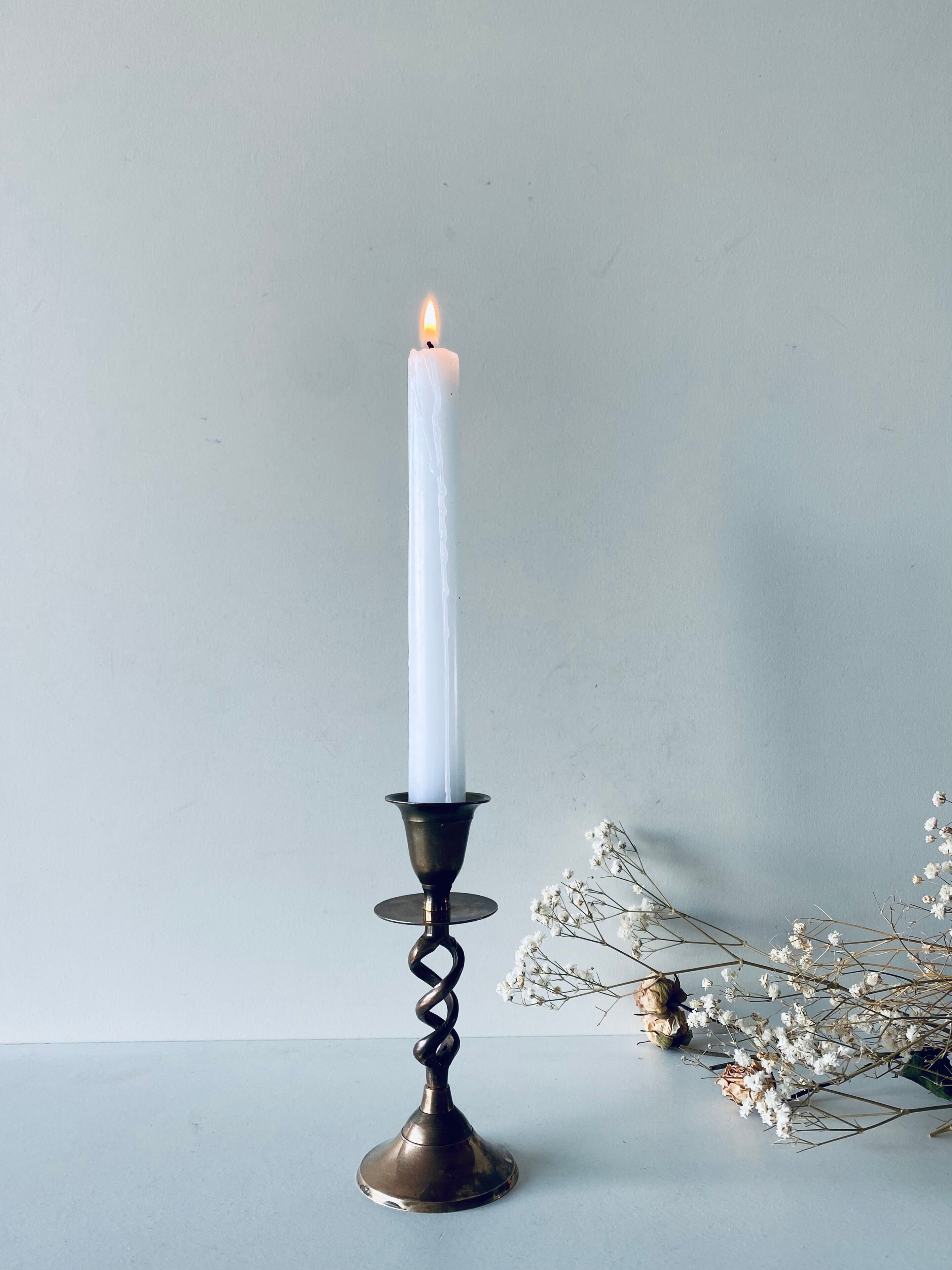 Twisted brass candle holder