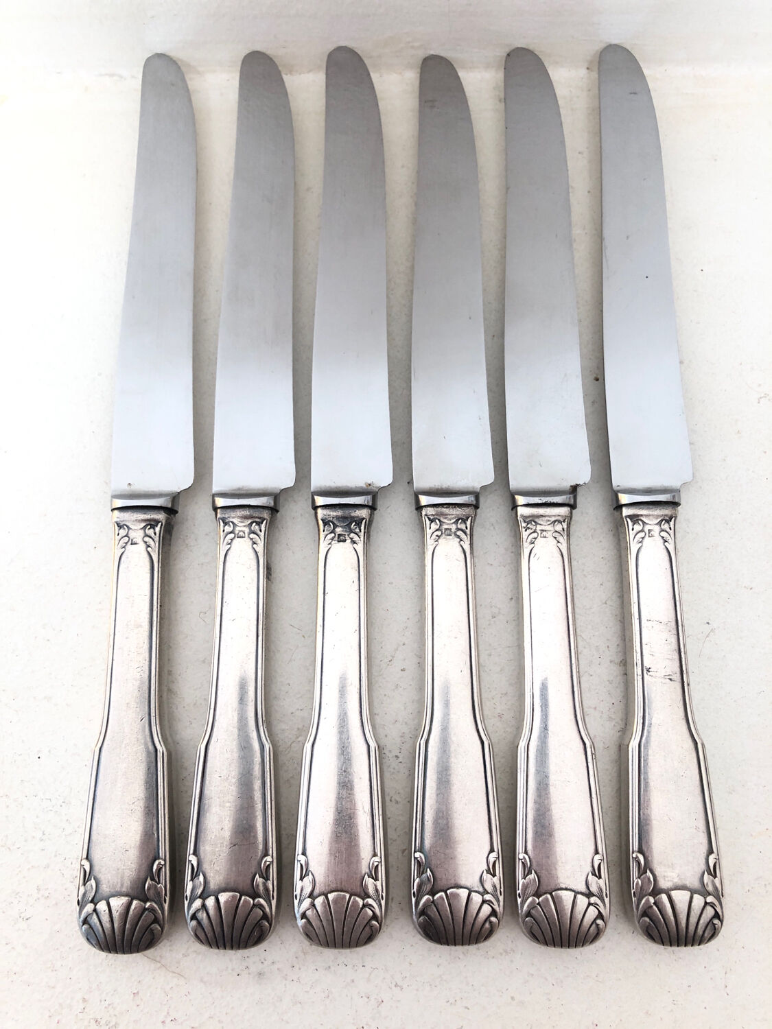 6 silver metal knives, 1930