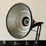 Old articulated desk lamp in red metal