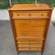 Secretary with drop-leaf in Louis XVI style, made of solid wood and brass, desk/commode.