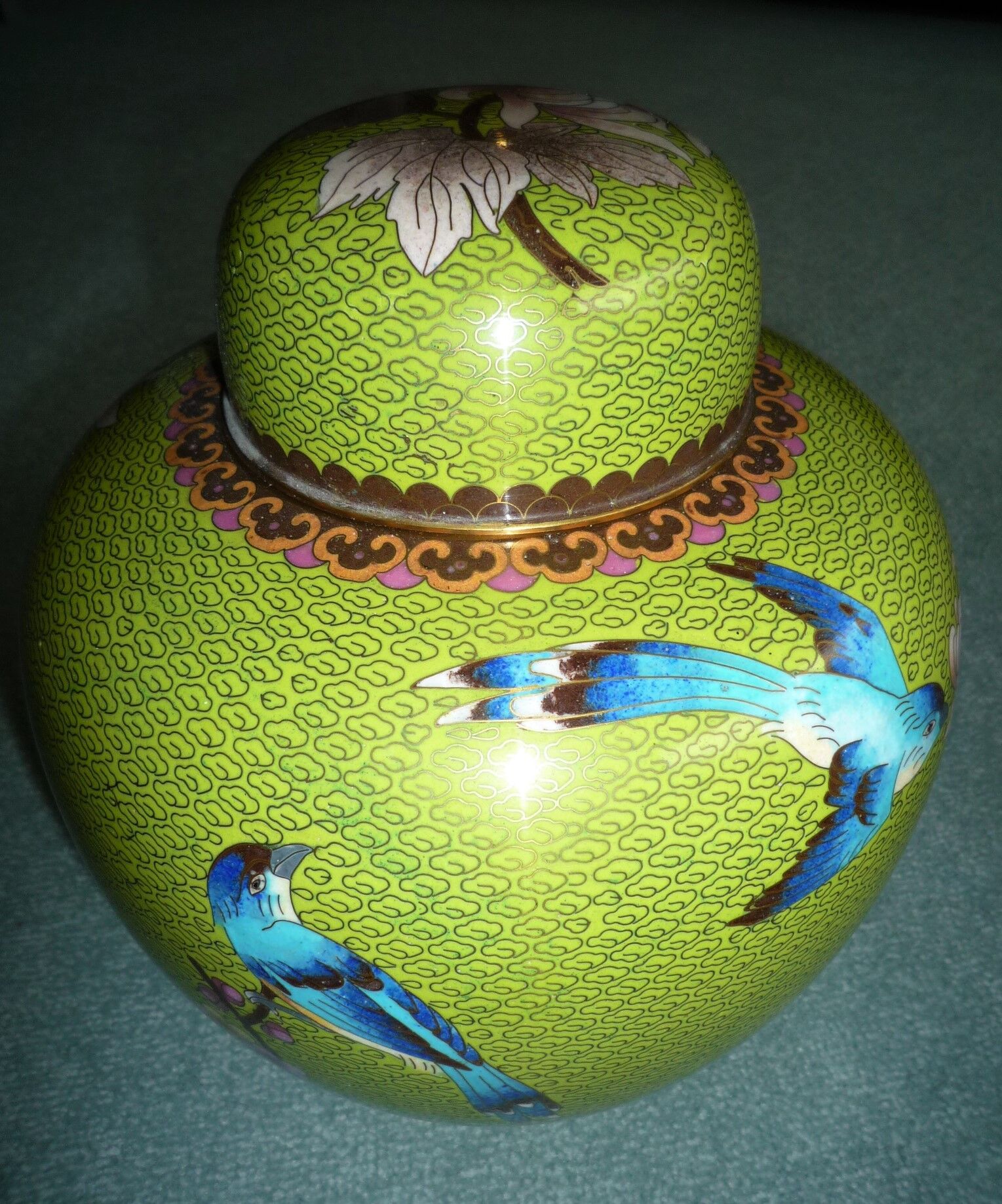 Pair of ginger-covered pots in polychrome enamels