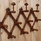 Turned wood wall coat rack
