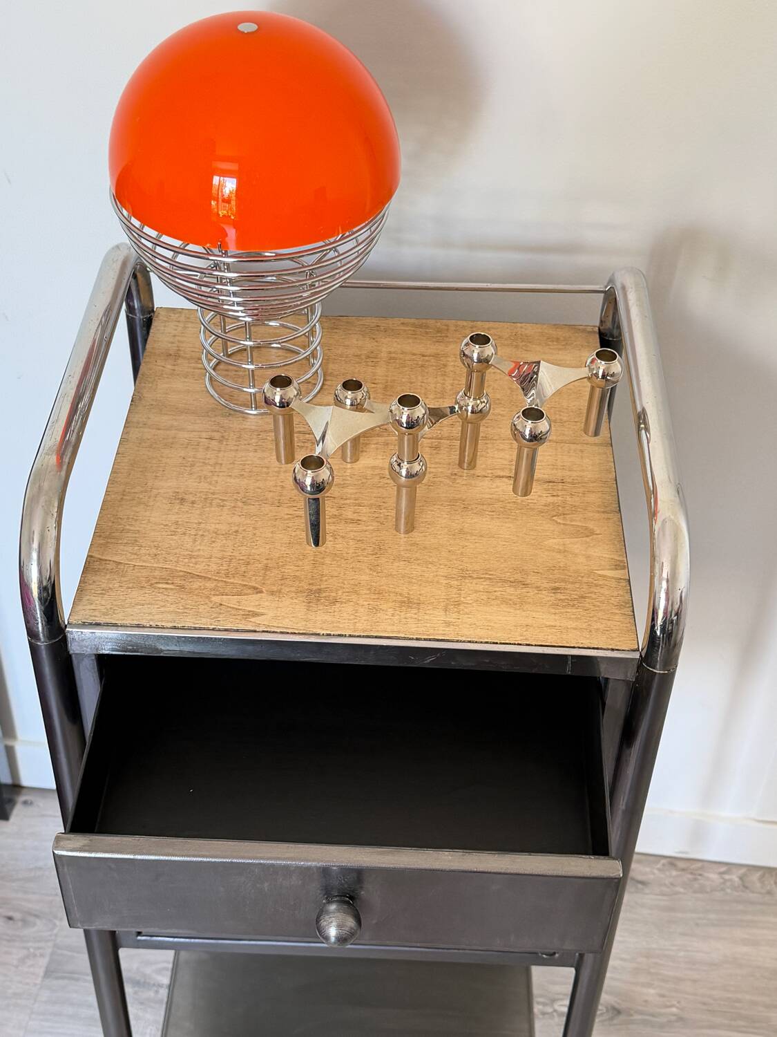 Vintage bedside table in brushed metal