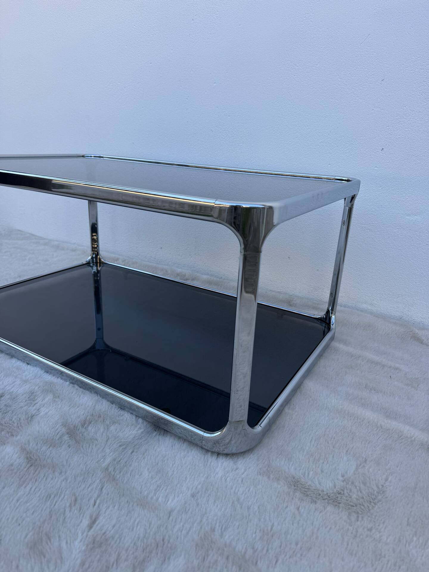 Chrome and smoked glass coffee table from the 1970s.
